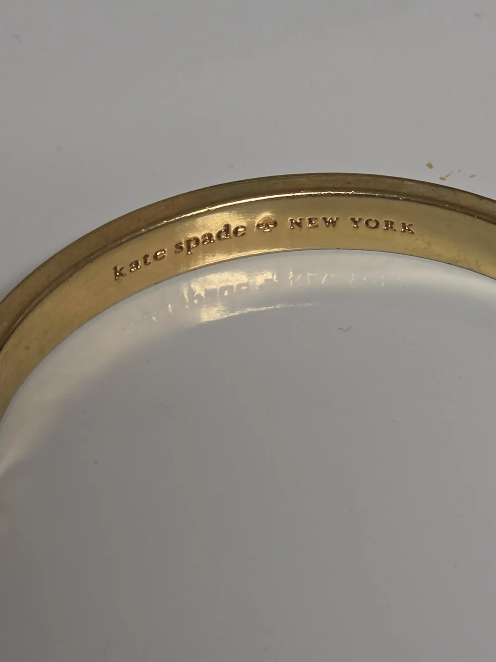 kate spade Gold Tone Bangle with Cream Enamel